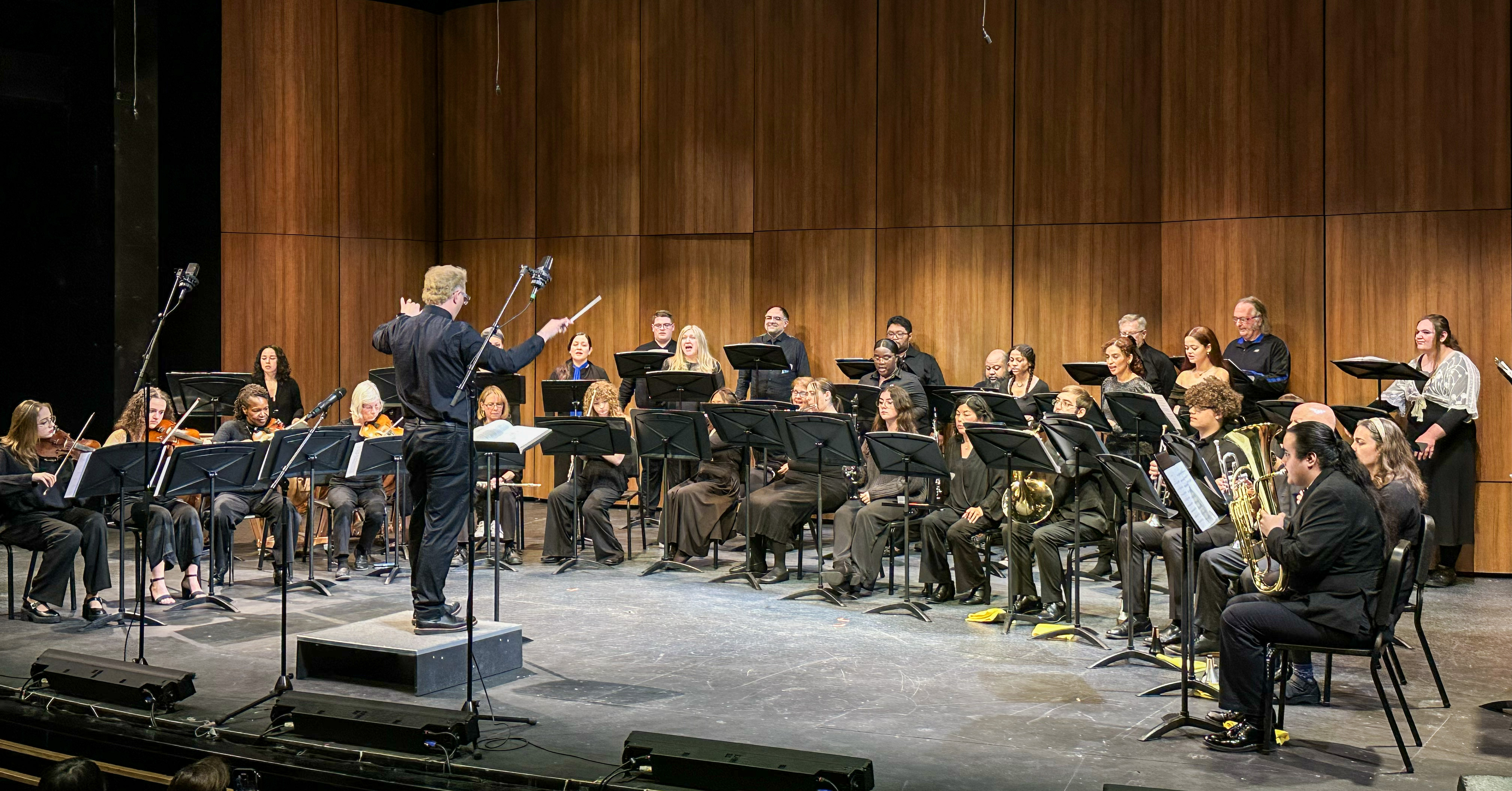 The SCC Chamber Choir and Orchestra perform on stage at the SCC Performing Arts Center.