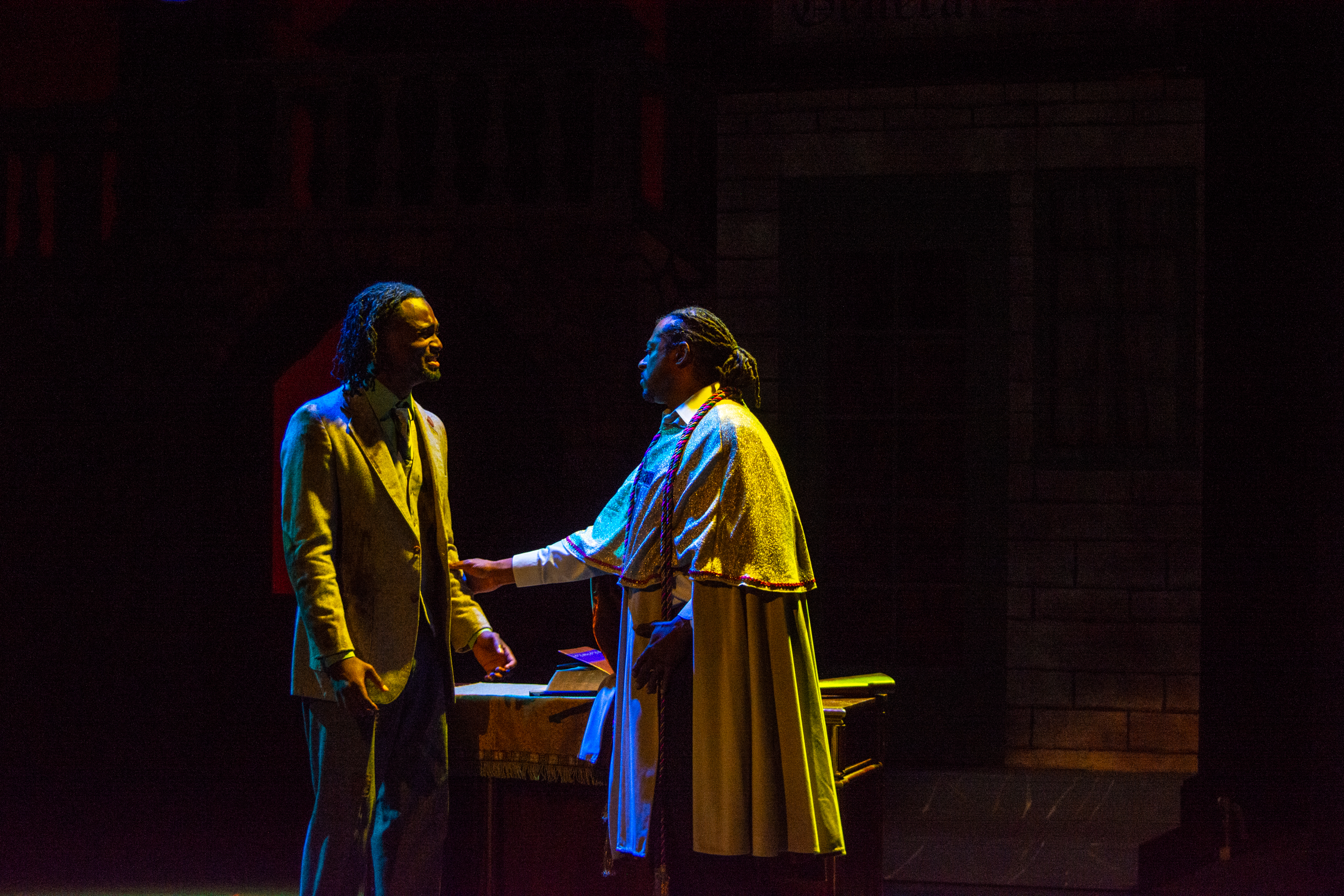 Two performers on stage during Solano College Theatre's production of "The Visit" in 2024