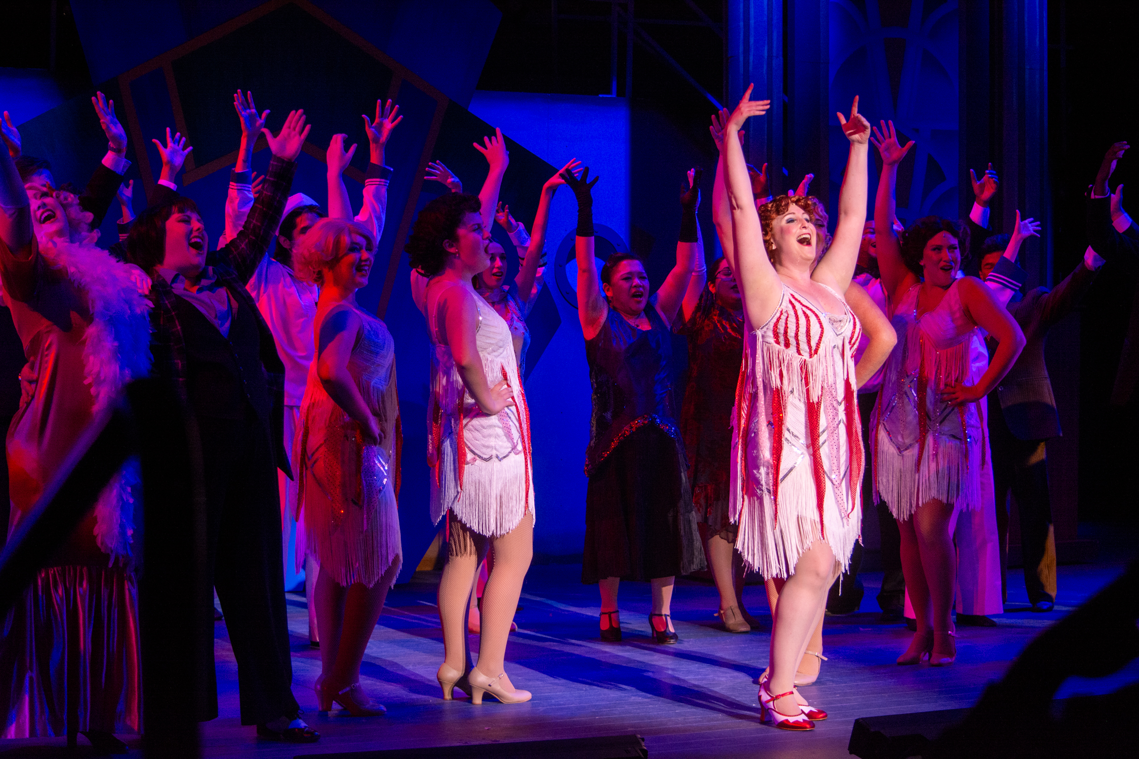 The cast of "Anything Goes" singing on stage at Solano College Theatre in 2024