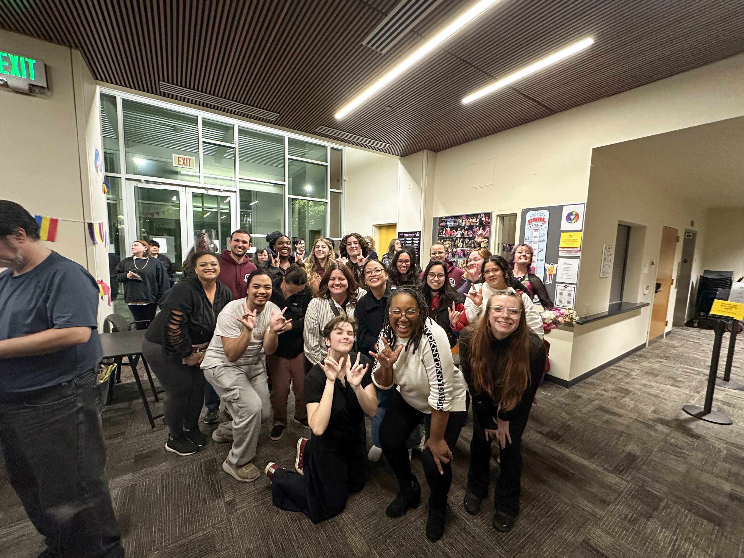 Group of people posing for photo